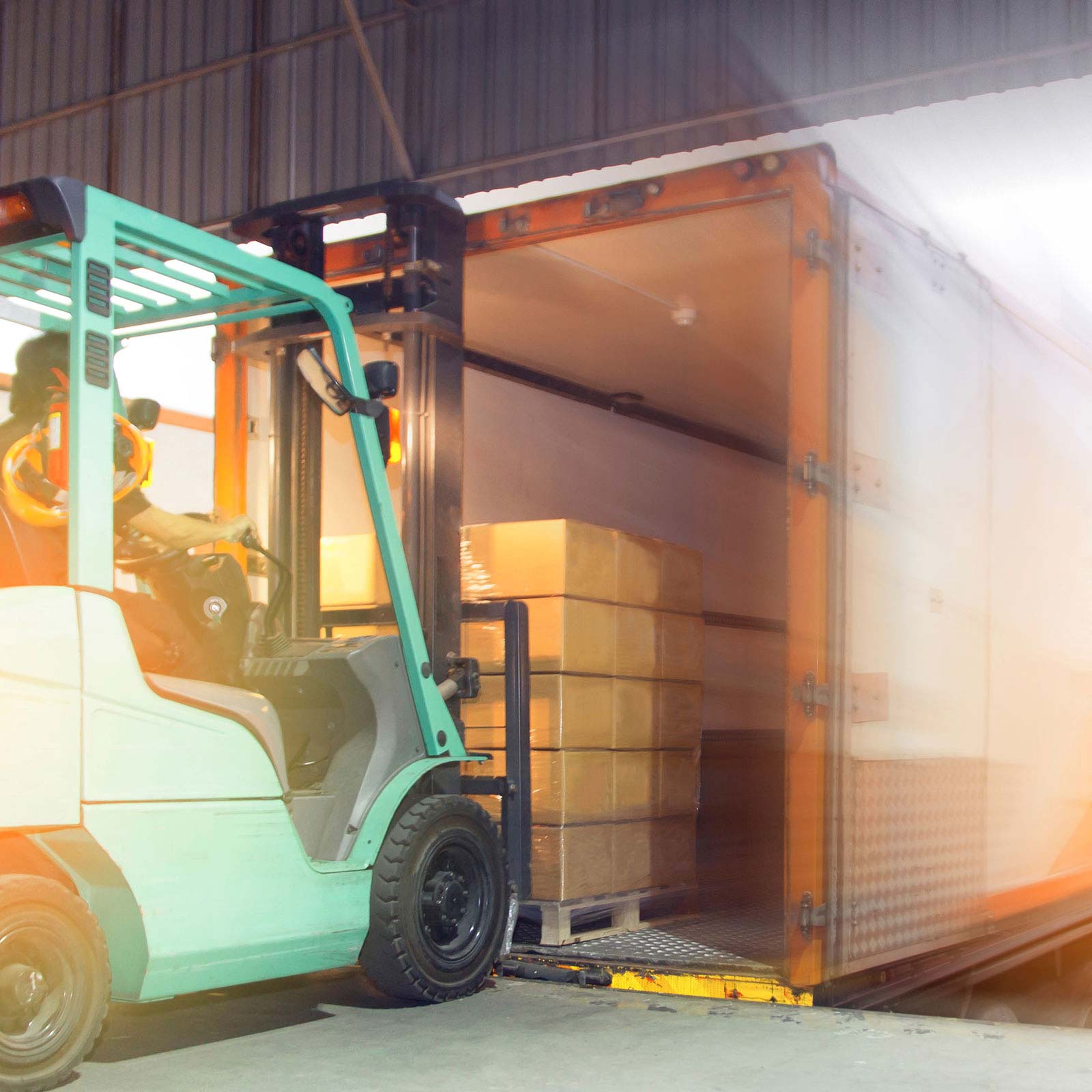 Loading truck at warehouse dock.