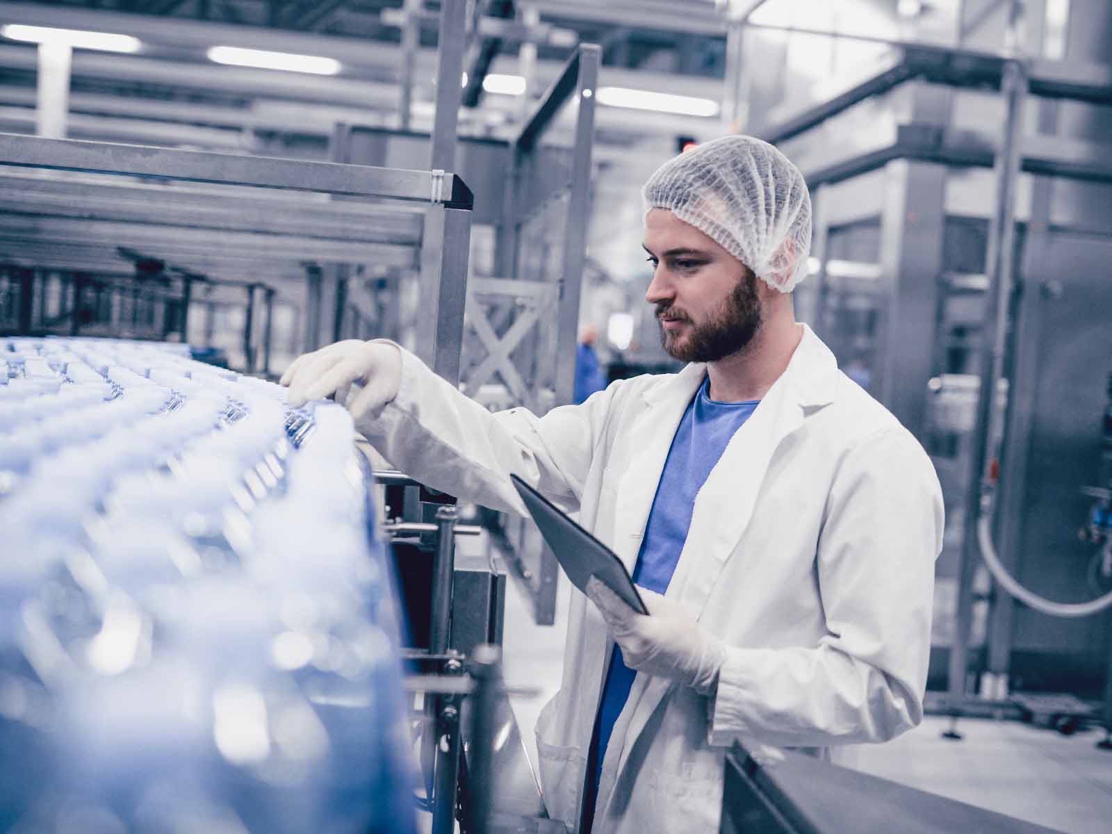 Quality control engineer inspecting a line